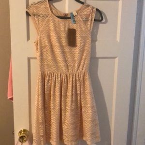 Frencescas peachy-nude lace dress